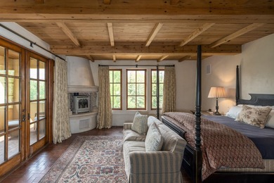 Nestled on 21.77 private acres in Bellevue, this Tuscan estate - photo 32