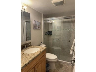 Welcome to this charming two-bedroom, two-bathroom condominium - photo 4