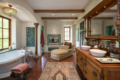 Nestled on 21.77 private acres in Bellevue, this Tuscan estate - photo 35