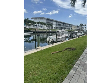 Welcome to this charming two-bedroom, two-bathroom condominium - photo 6