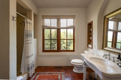 Nestled on 21.77 private acres in Bellevue, this Tuscan estate - photo 44