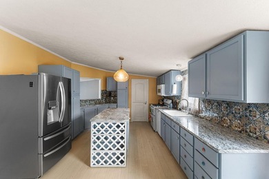 Welcome home to this beautifully updated 3-bedroom, 1.75-bath - photo 10