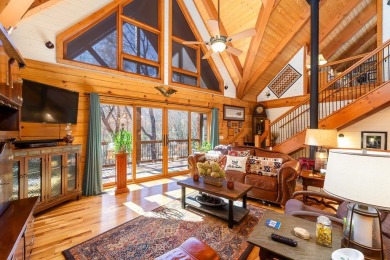 Escape to this beautifully crafted 2BR/2.5BA, 2.5-story cabin