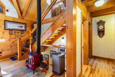 Escape to this beautifully crafted 2BR/2.5BA, 2.5-story cabin