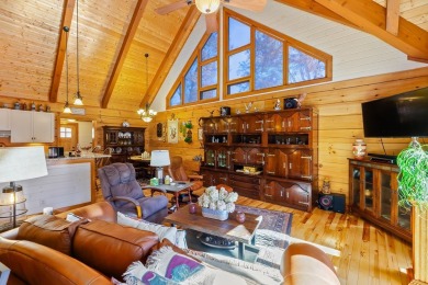 Escape to this beautifully crafted 2BR/2.5BA, 2.5-story cabin