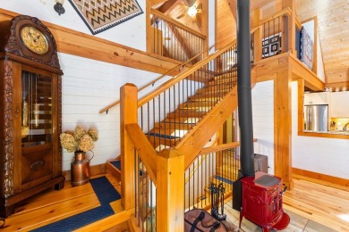 Escape to this beautifully crafted 2BR/2.5BA, 2.5-story cabin