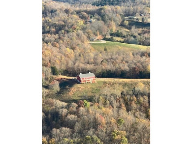 Nestled on a sprawling 84.49-acre property, this stunning home - photo 3