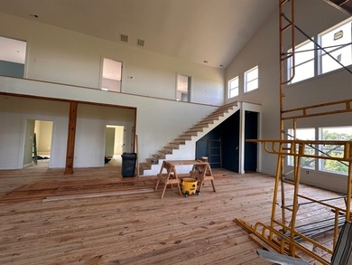 Nestled on a sprawling 84.49-acre property, this stunning home - photo 8