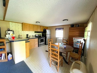 Tucked into a peaceful setting, this home invites you to slow - photo 12
