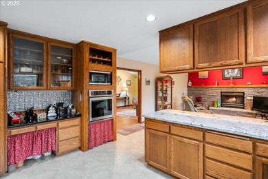 Welcome to this custom-built, single-level home that truly