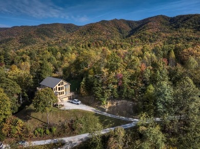 Welcome to Grand View Falls, where this custom-built residence - photo 2