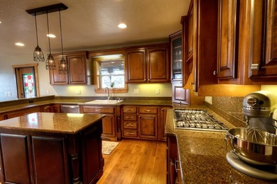 Welcome to Grand View Falls, where this custom-built residence - photo 6
