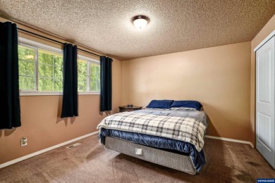 Spacious home on a large lot located in the Gubser school