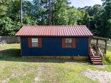 Escape to lake life in this charming fully furnished 1-bedroom - photo 15