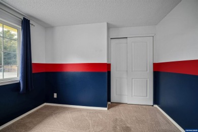 Spacious home on a large lot located in the Gubser school