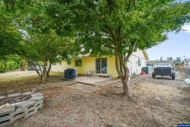 Spacious home on a large lot located in the Gubser school