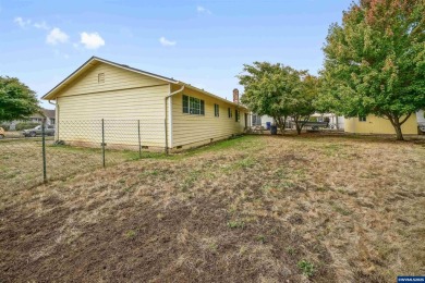 Spacious home on a large lot located in the Gubser school