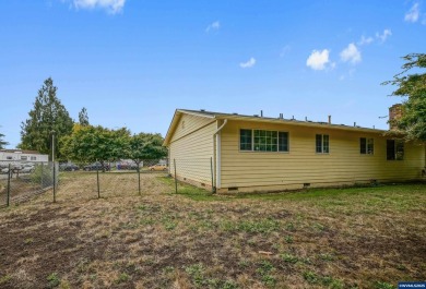 Spacious home on a large lot located in the Gubser school