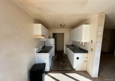 This spacious two-bedroom cooperative-style apartment is located - photo 5