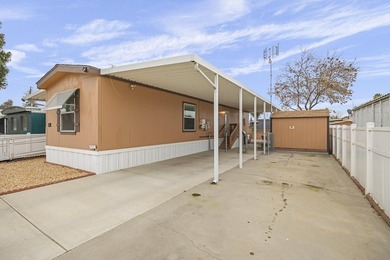 Located in a well-maintained 55+ senior community in Tulare - photo 5