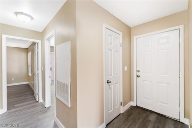 Don't miss this beautifully updated first-floor condo in a very