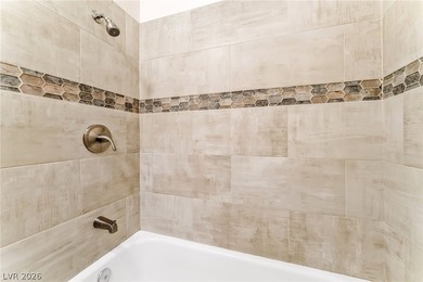 Don't miss this beautifully updated first-floor condo in a very