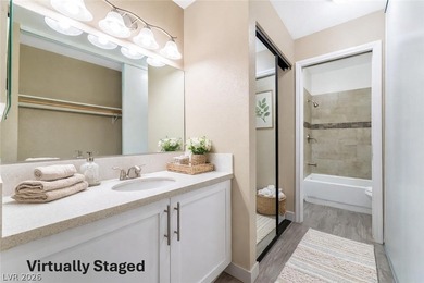 Don't miss this beautifully updated first-floor condo in a very