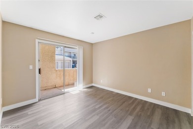 Don't miss this beautifully updated first-floor condo in a very