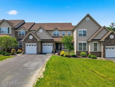 This pristine 3-bedroom, 2.5-bath townhome showcases an - photo 1
