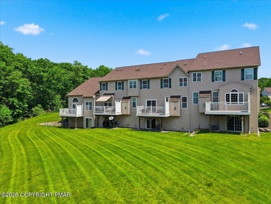 This pristine 3-bedroom, 2.5-bath townhome showcases an - photo 2