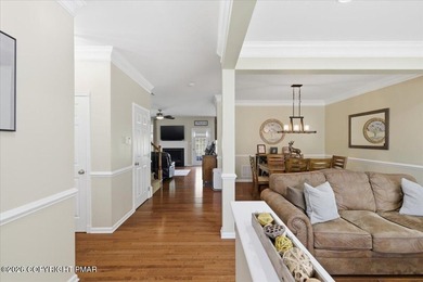 This pristine 3-bedroom, 2.5-bath townhome showcases an - photo 4