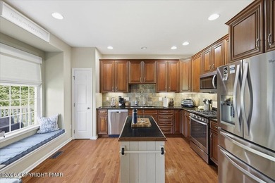 This pristine 3-bedroom, 2.5-bath townhome showcases an - photo 7