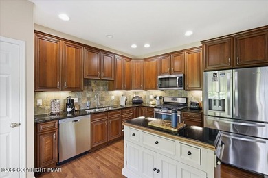 This pristine 3-bedroom, 2.5-bath townhome showcases an - photo 8