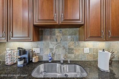 This pristine 3-bedroom, 2.5-bath townhome showcases an - photo 10