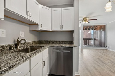 Discover effortless living in Diamondhead with this easy-care - photo 6