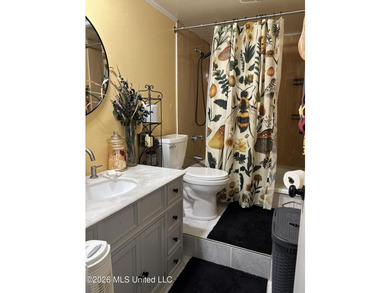 Discover effortless living in Diamondhead with this easy-care - photo 2