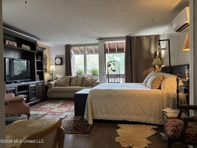 Discover effortless living in Diamondhead with this easy-care - photo 3