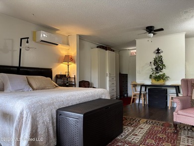 Discover effortless living in Diamondhead with this easy-care - photo 5