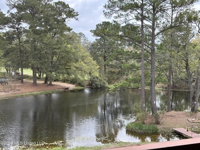Discover effortless living in Diamondhead with this easy-care - photo 6