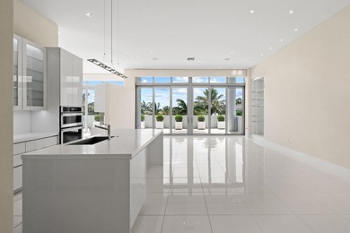 Step through the lobby level entry into ceilings that hold at - photo 1