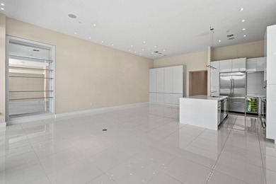 Step through the lobby level entry into ceilings that hold at - photo 8