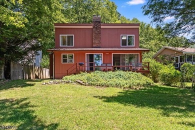 Rare lakefront opportunity on Plymouth Lake! This move-in ready