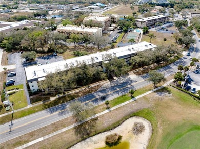 This beautifully updated second-floor unit showcases quality