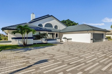 Experience refined South Florida living in this fully renovated - photo 3