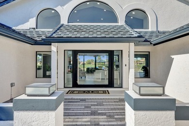 Experience refined South Florida living in this fully renovated - photo 4