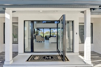 Experience refined South Florida living in this fully renovated - photo 5