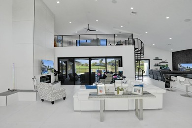 Experience refined South Florida living in this fully renovated - photo 6