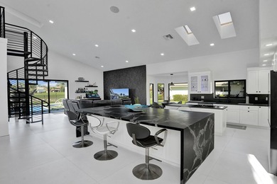Experience refined South Florida living in this fully renovated - photo 8