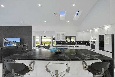 Experience refined South Florida living in this fully renovated - photo 9