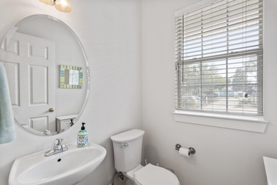 Location! Location! Welcome to 84 Tradewinds Drive, a charming - photo 14